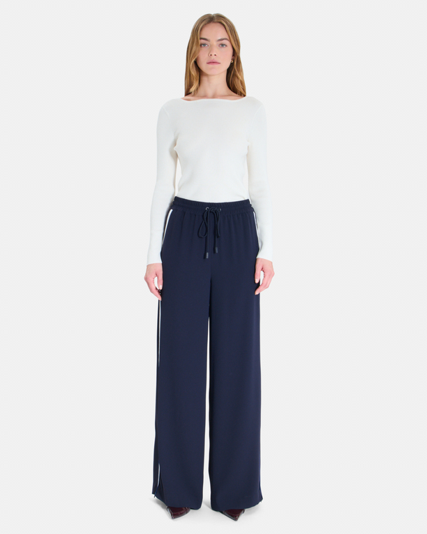 Posy Pants Flowy trousers with a nighttime tie ZAPA